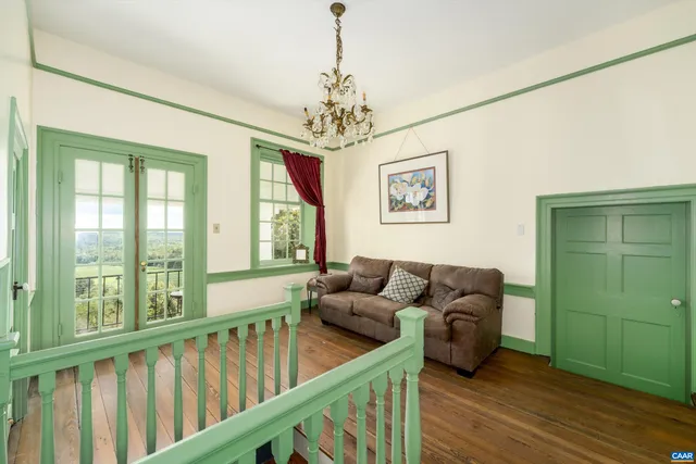 a view of a balcony with staircase