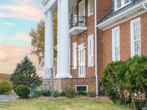 a view of a building with a garden