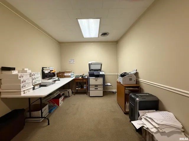 a room with furniture and a wooden floor