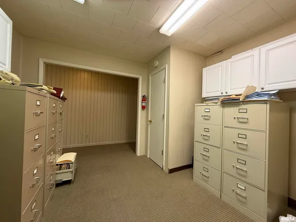 a kitchen with stainless steel appliances a refrigerator and a stove