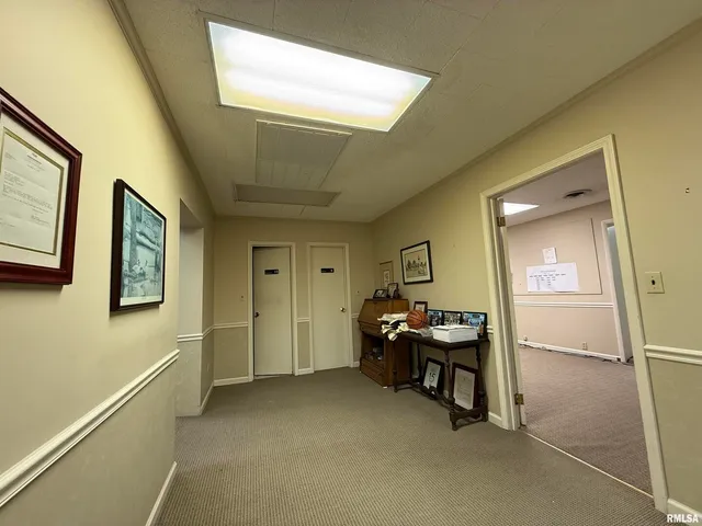 a kitchen with stainless steel appliances granite countertop a refrigerator and a stove