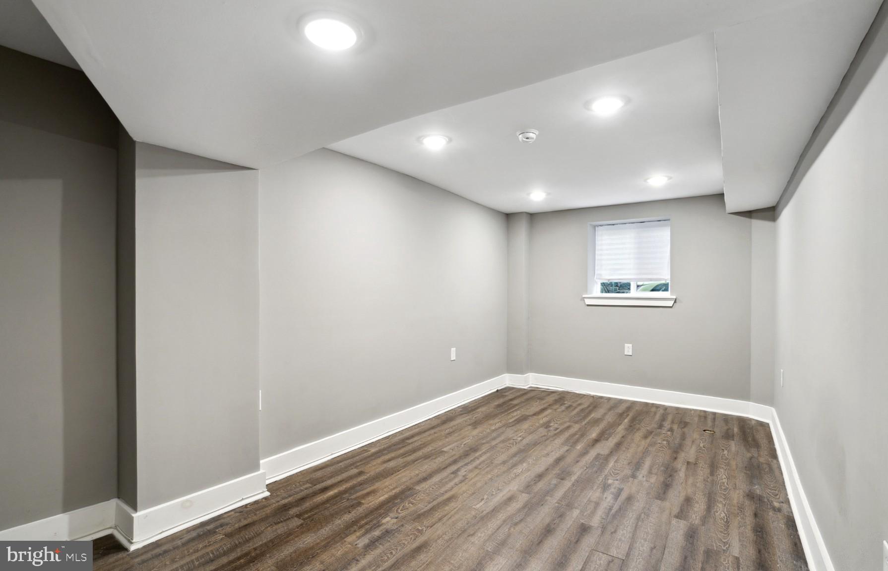 38 Copley Road Upper Darby, PA 19082 - Photo 21 of 22 a view of room with wooden floor and window