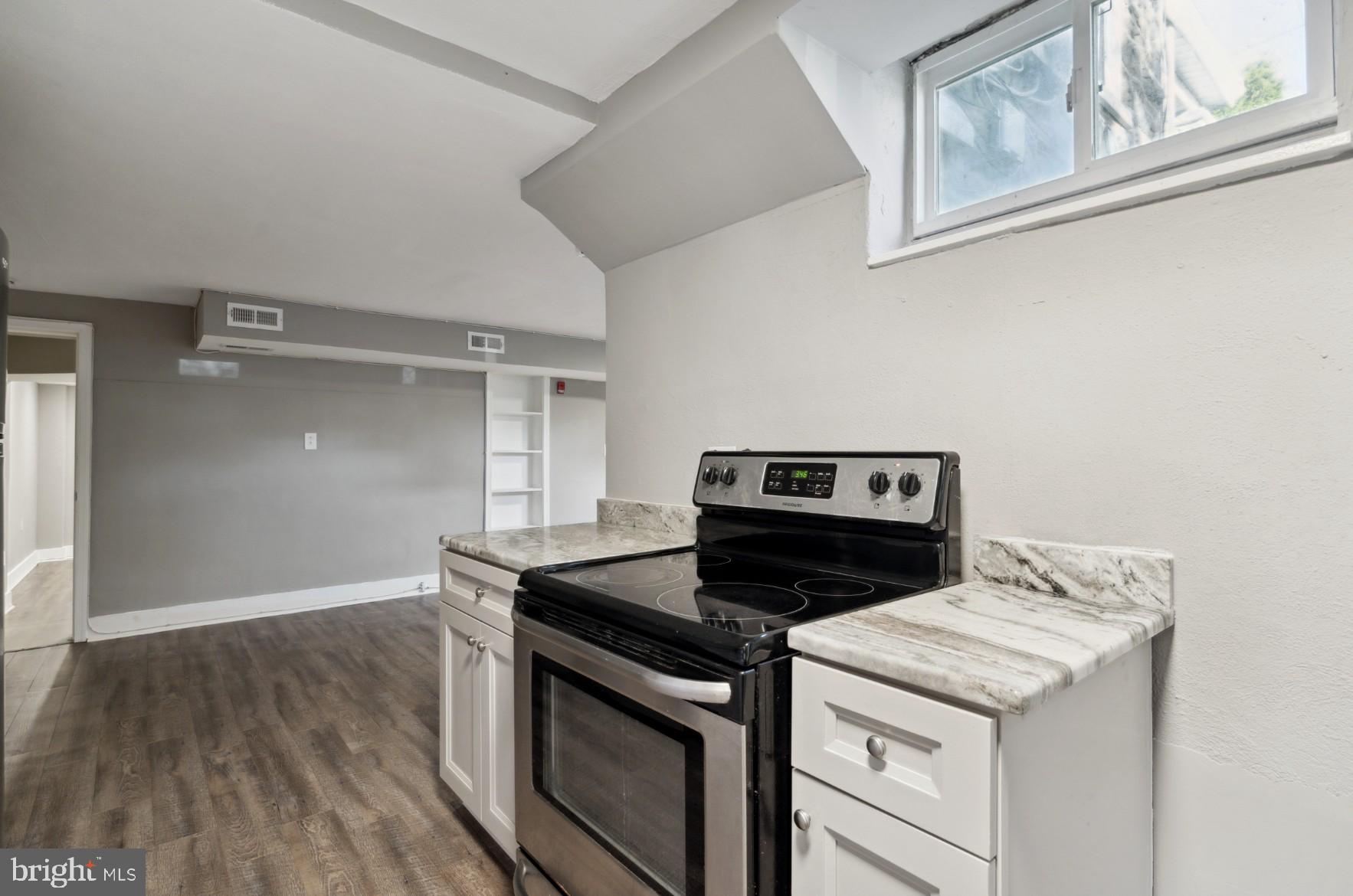 38 Copley Road Upper Darby, PA 19082 - Photo 22 of 22 a stove top oven sitting inside of a kitchen