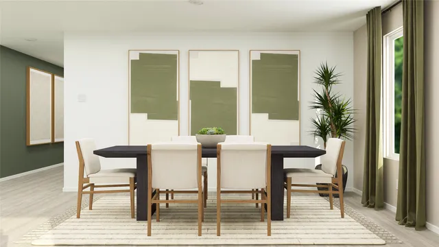 a view of a dining room with furniture and window