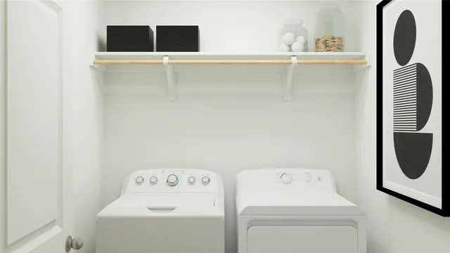 a utility room with dryer and washer