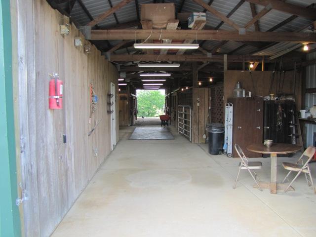 7761 Shoals Branch Road Primm Springs, TN 38476 - Photo 16 of 20 Inside barn are 7 - 12x10 stalls including 1 - 19x10 birthing stall & tack room with half bath. Excellent boarding space to produce income.
