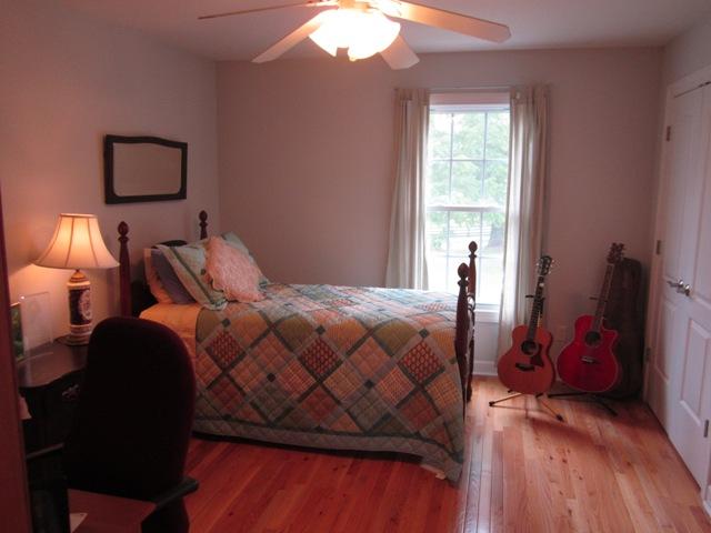 7761 Shoals Branch Road Primm Springs, TN 38476 - Photo 9 of 20 Bedroom 2 also features glowing hardwood floors & has double closets.