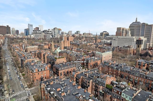 a view of a city with tall buildings