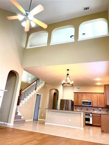 a view of an ocean with a car park