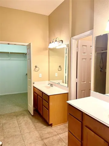 a view of outdoor space with playground and green space