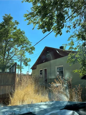 a top view of a house with a yard