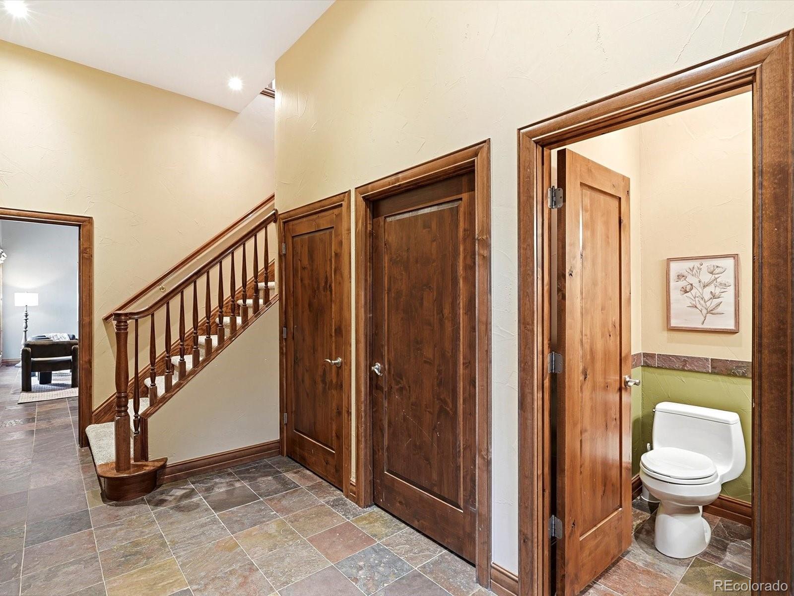187 Fox Ridge Drive Evergreen, CO 80439 - Photo 38 of 49 a view of a hallway with entryway