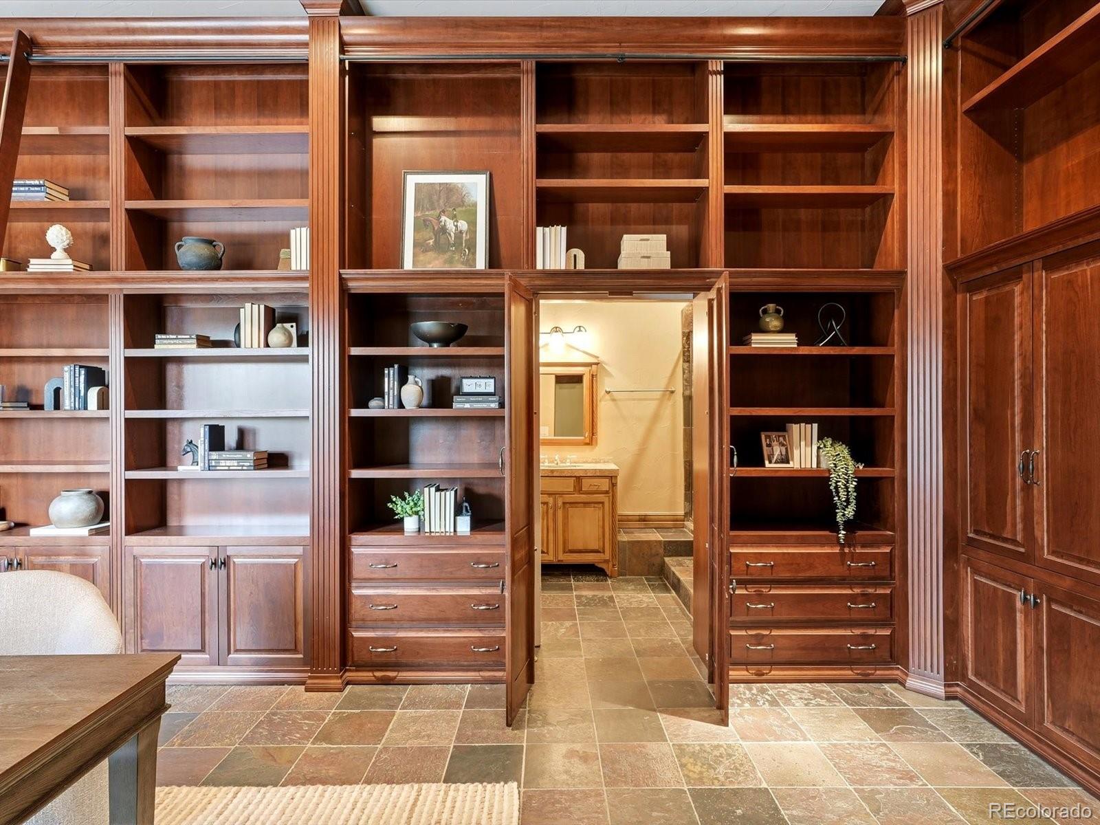 187 Fox Ridge Drive Evergreen, CO 80439 - Photo 39 of 49 a view of walk in closet with clothes and shoes