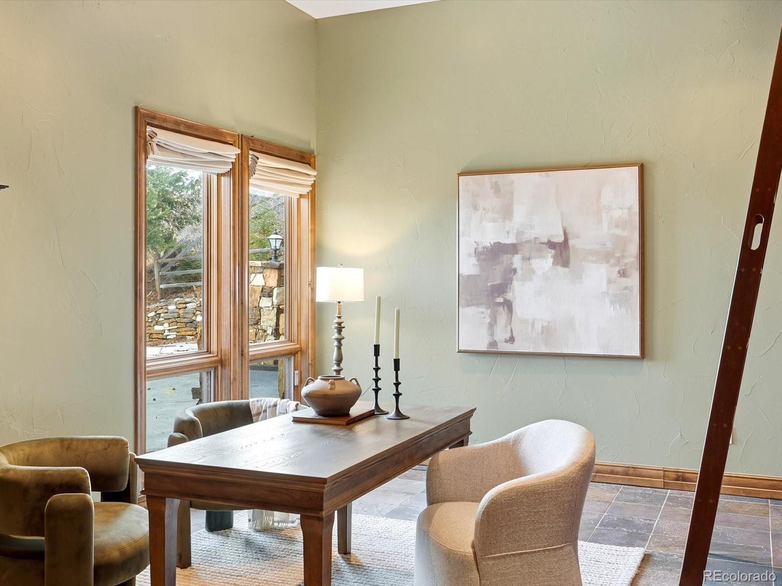 187 Fox Ridge Drive Evergreen, CO 80439 - Photo 40 of 49 a view of a livingroom with furniture and window