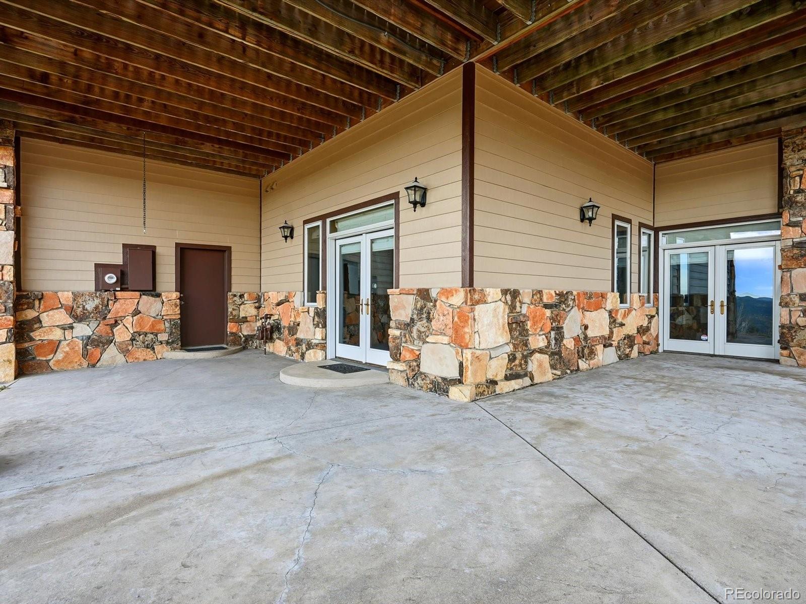 187 Fox Ridge Drive Evergreen, CO 80439 - Photo 44 of 49 a view of a room with gym equipment