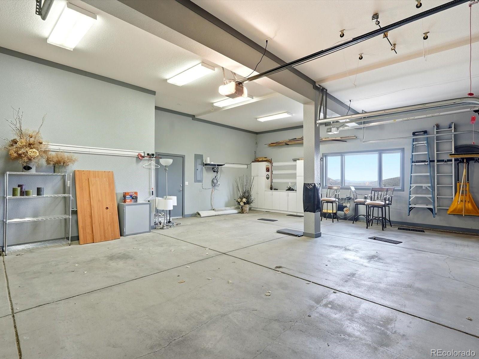 187 Fox Ridge Drive Evergreen, CO 80439 - Photo 49 of 49 a view of a livingroom with furniture and a ceiling fan