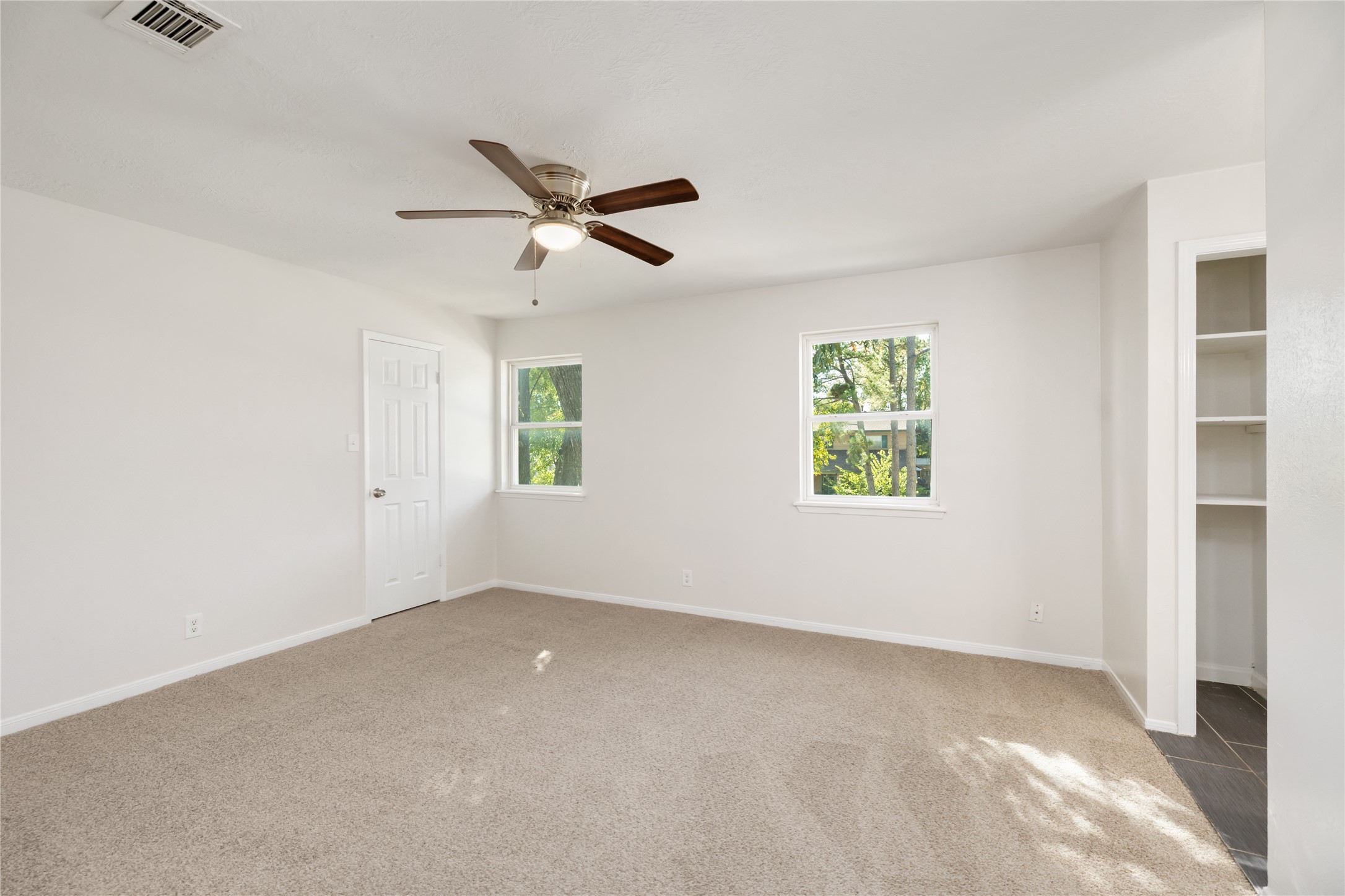 24118 Spring Mill Lane Spring, TX 77373 - Photo 15 of 24 a view of an empty room with a window
