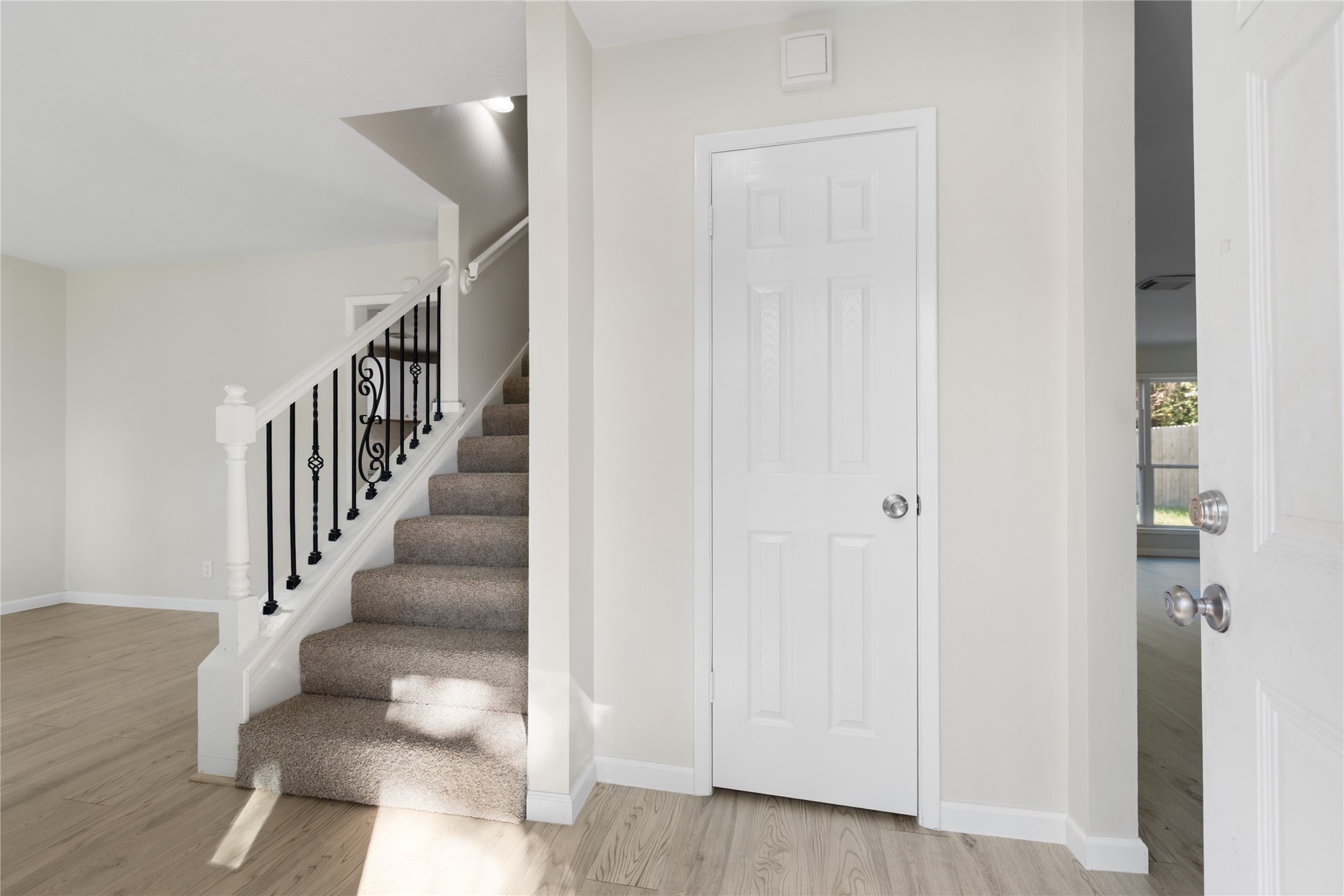 24118 Spring Mill Lane Spring, TX 77373 - Photo 3 of 24 a view of entryway and hall with wooden floor