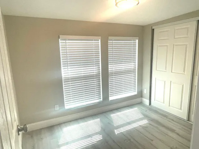 a view of a room that has a window in it