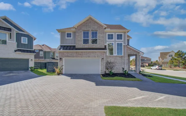 a city view with tall buildings and a yard in front of it