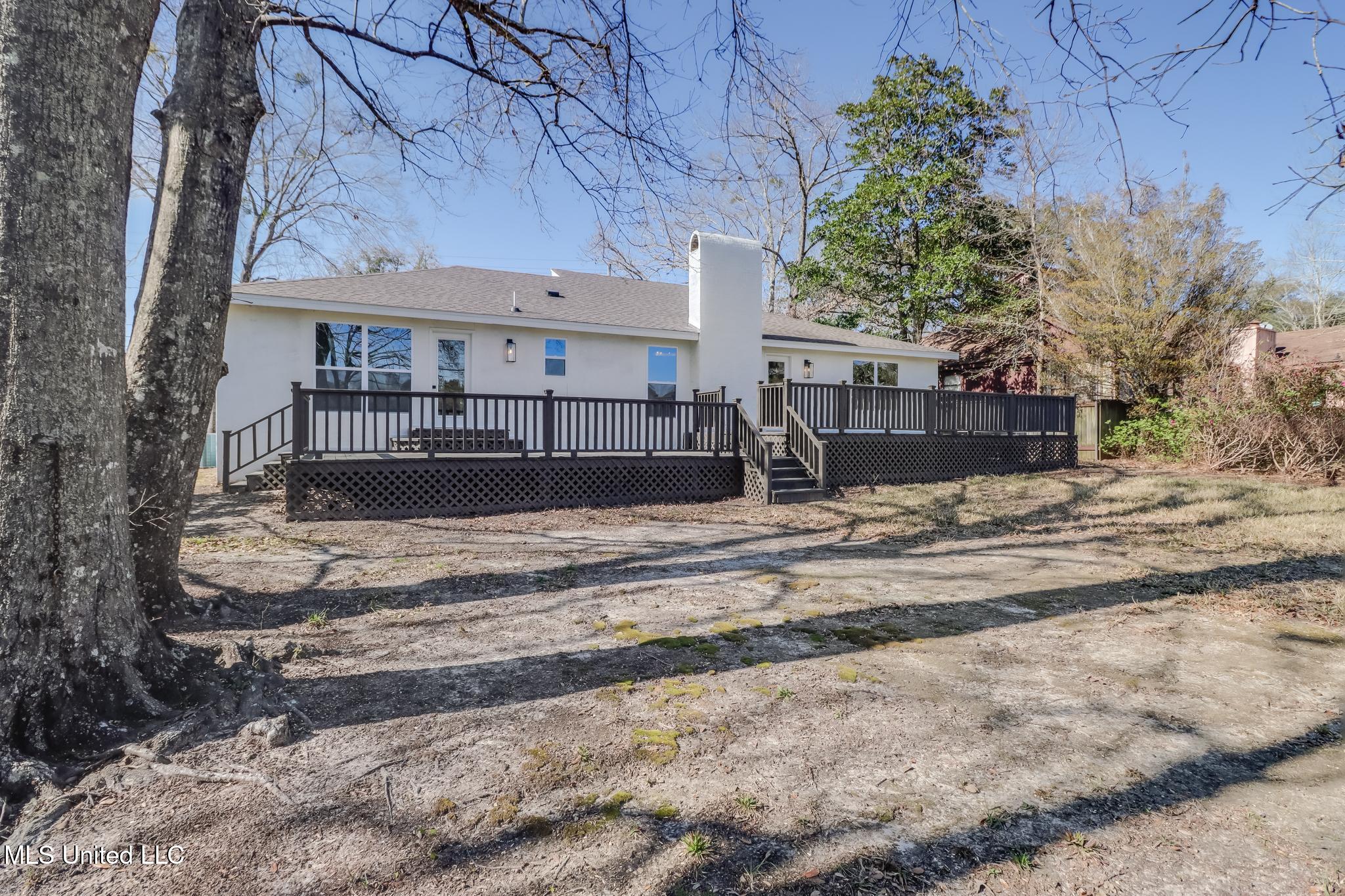 6828 Hilo Street Diamondhead, MS 39525 - Photo 32 of 36 Rear View 2