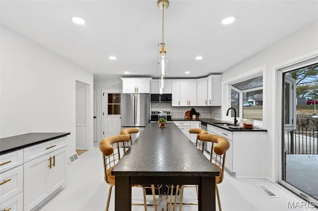 $299,900 | 12974 Partridge Run Drive, Florissant, MO 63033