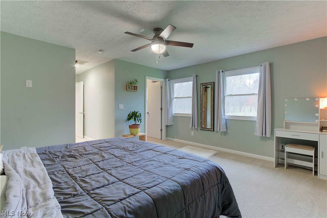 2959 Canton Road Uniontown, OH 44685 - Photo 21 of 34 Master suite. Walk-in closet to the right, bath to the right.