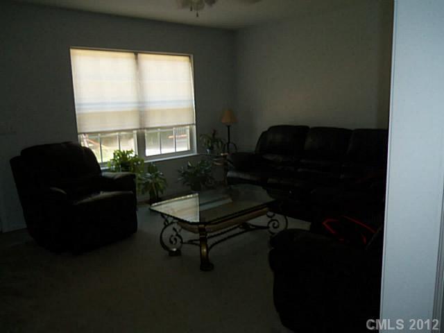 4841 Old Hickory Road, Unit 1 Lancaster, SC 29720 - Photo 2 of 11 a living room with furniture and a window