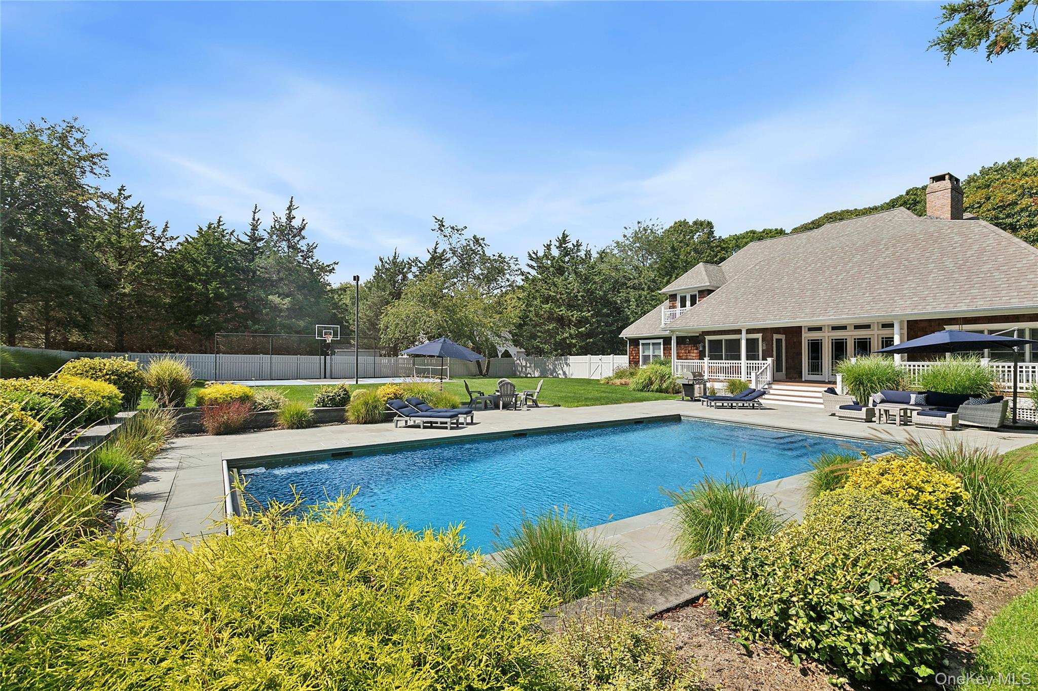3470 North Bayview Road Southold, NY 11971 - Photo 16 of 25 View of pool with a patio area and an outdoor living space