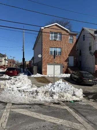 a view of a street with cars