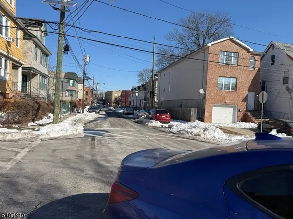 a view of a street with cars