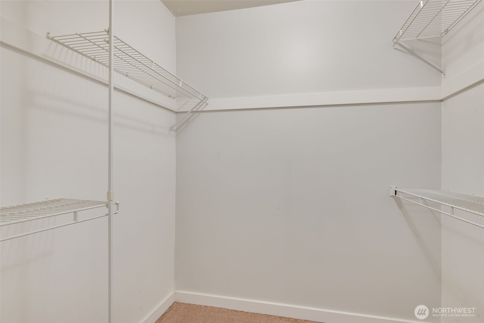 1425 South Puget Drive, Unit B3 Renton, WA 98055 - Photo 18 of 24 a view of a room with racks on the wall