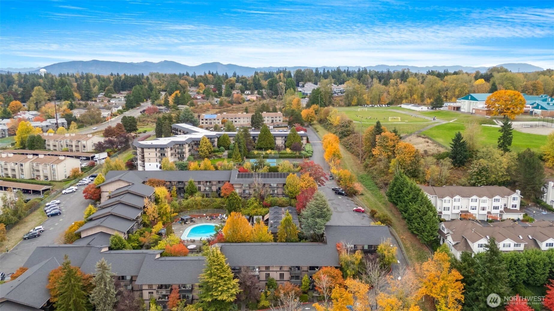 1425 South Puget Drive, Unit B3 Renton, WA 98055 - Photo 23 of 24 an aerial view of residential houses with outdoor space