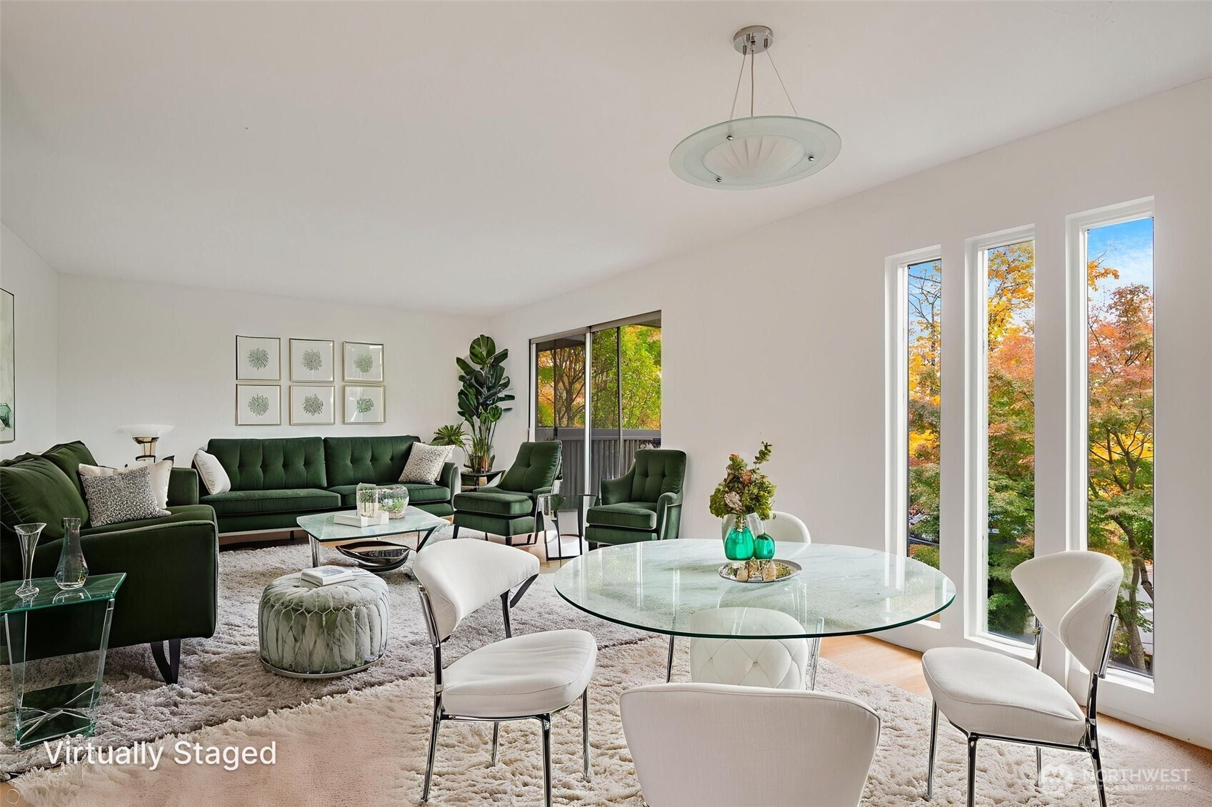 1425 South Puget Drive, Unit B3 Renton, WA 98055 - Photo 5 of 24 a living room with furniture and a table