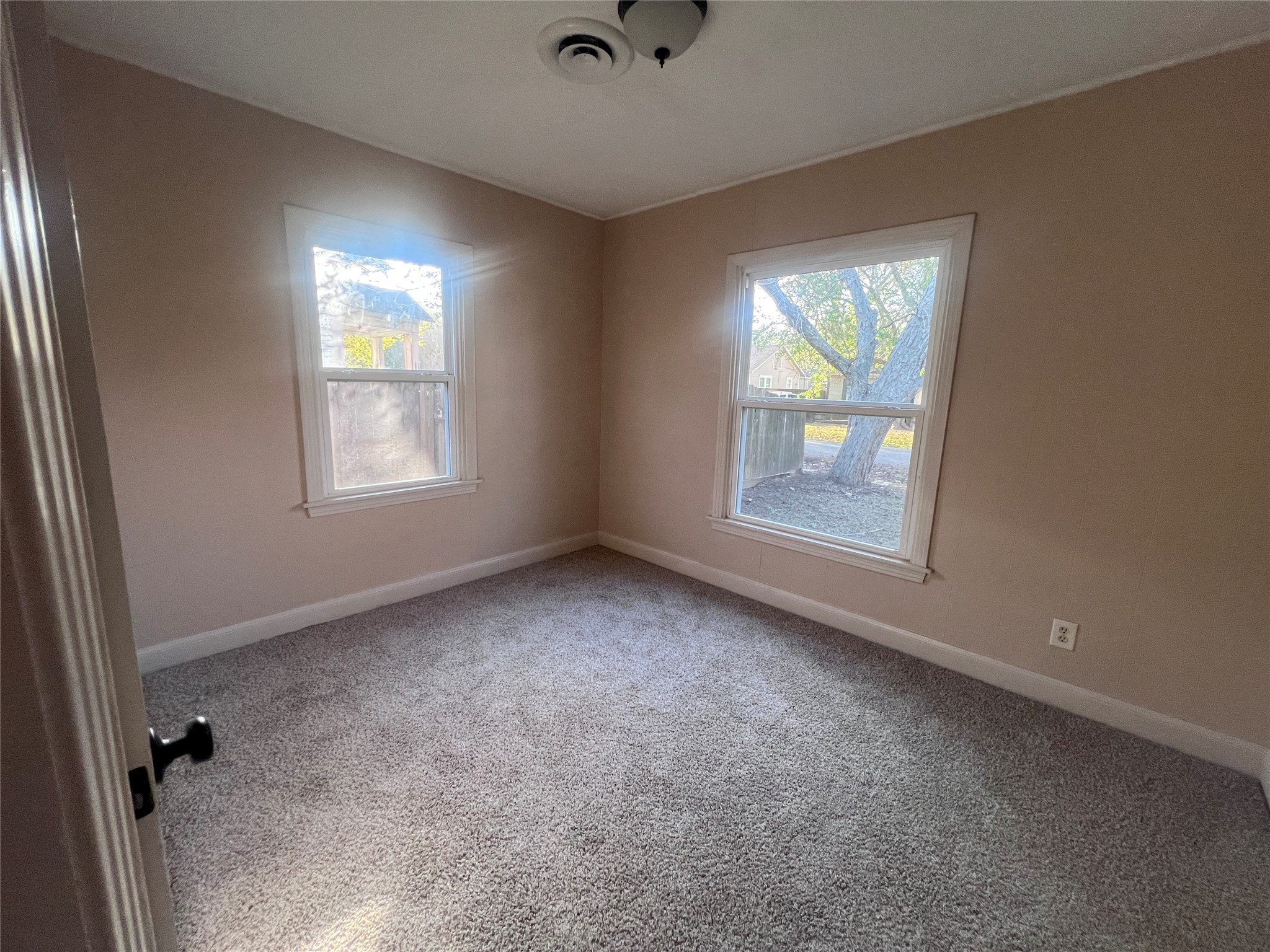 620 Koehl Street Wharton, TX 77488 - Photo 36 of 37 an empty room with a window