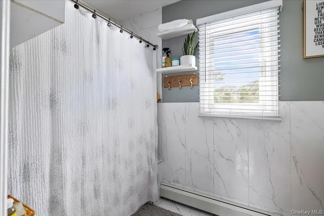 a close up of a curtain with a window