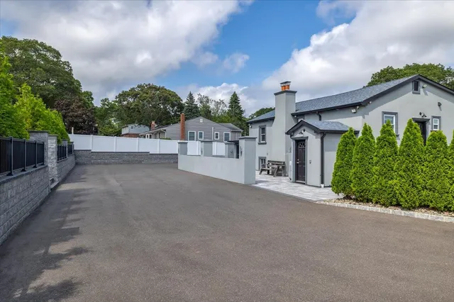 front view of a house with a street
