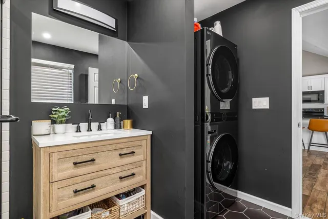 a view of a backyard with wooden fence and large trees