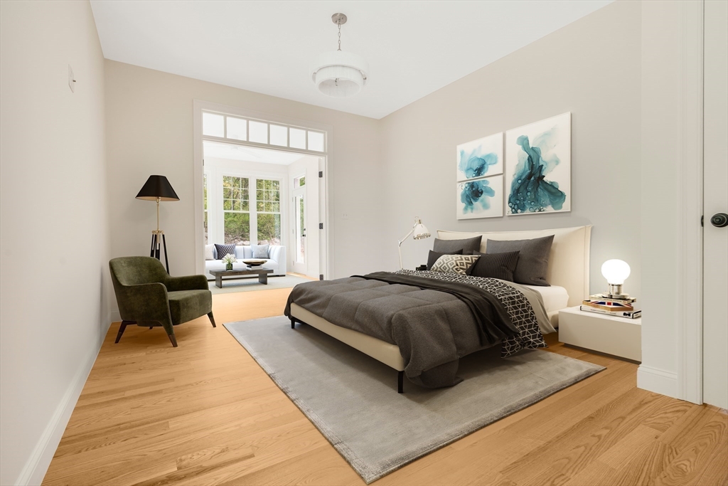 47 Spring Street Rehoboth, MA 02769 - Photo 12 of 35 a spacious bedroom with a bed and a couch