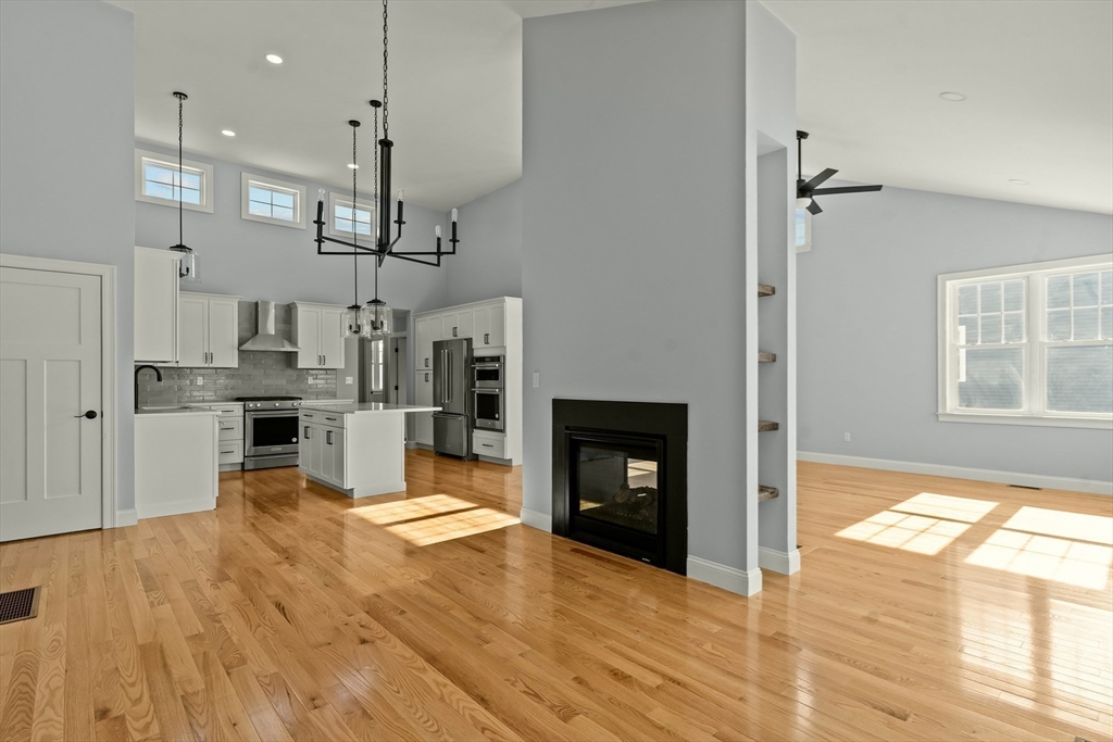 47 Spring Street Rehoboth, MA 02769 - Photo 16 of 35 a view of large kitchen with cabinets and wooden floor