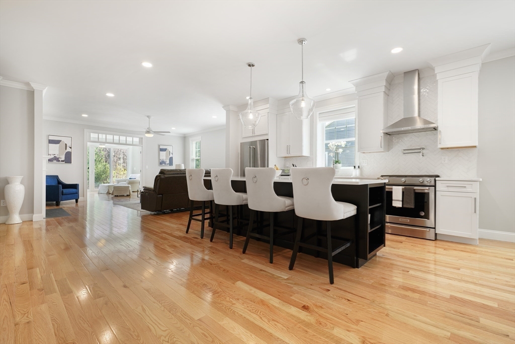 47 Spring Street Rehoboth, MA 02769 - Photo 27 of 35 a large kitchen with a table and chairs