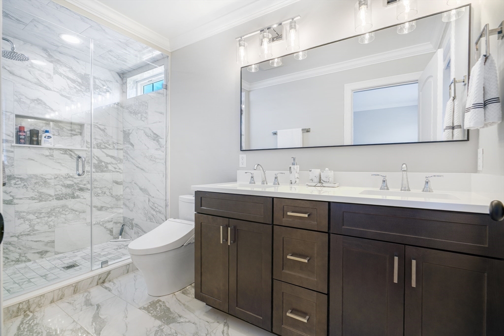 47 Spring Street Rehoboth, MA 02769 - Photo 29 of 35 a bathroom with a bathtub shower sink mirror and toilet