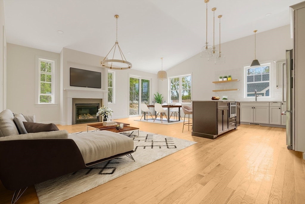 47 Spring Street Rehoboth, MA 02769 - Photo 8 of 35 a bedroom with a bed furniture and a fireplace