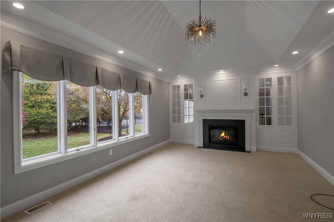 5215 Fox Trace Buffalo, NY 14221 - Photo 19 of 47 family room with upgraded fireplace