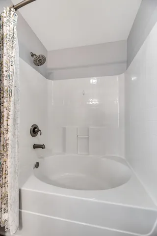 a bathroom with a bathtub