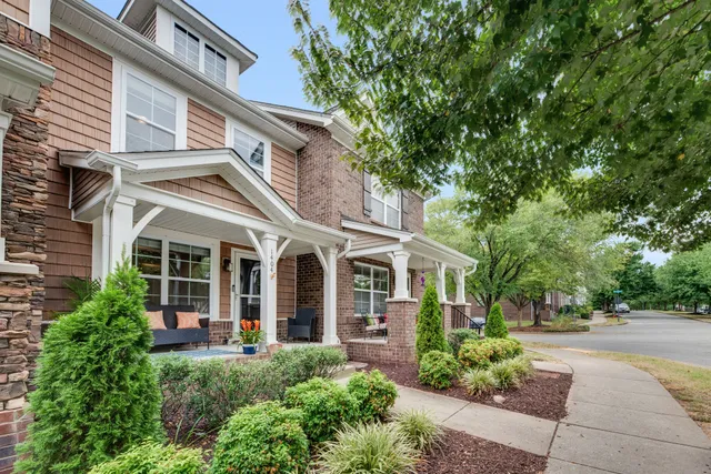 front view of a house with a garden