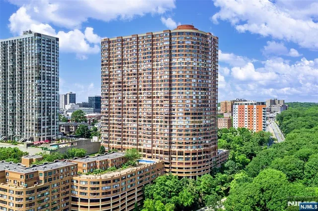 a view of a city with tall buildings
