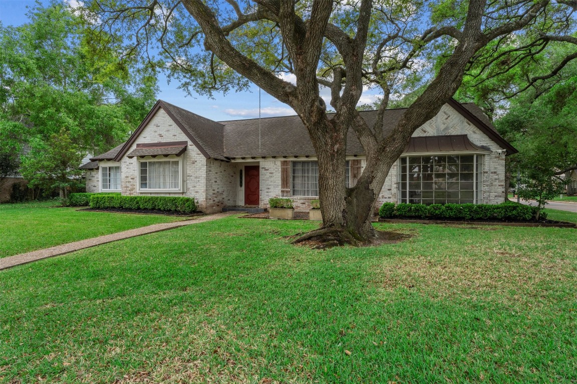 602 Aldersgate Court Katy, TX 77450 - Photo 21 of 24 a front view of house with yard and green space