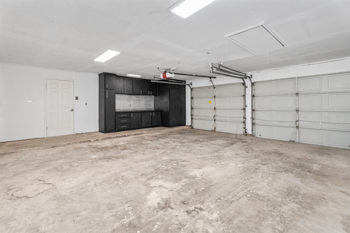 602 Aldersgate Court Katy, TX 77450 - Photo 23 of 24 a view of empty room with garage and racks