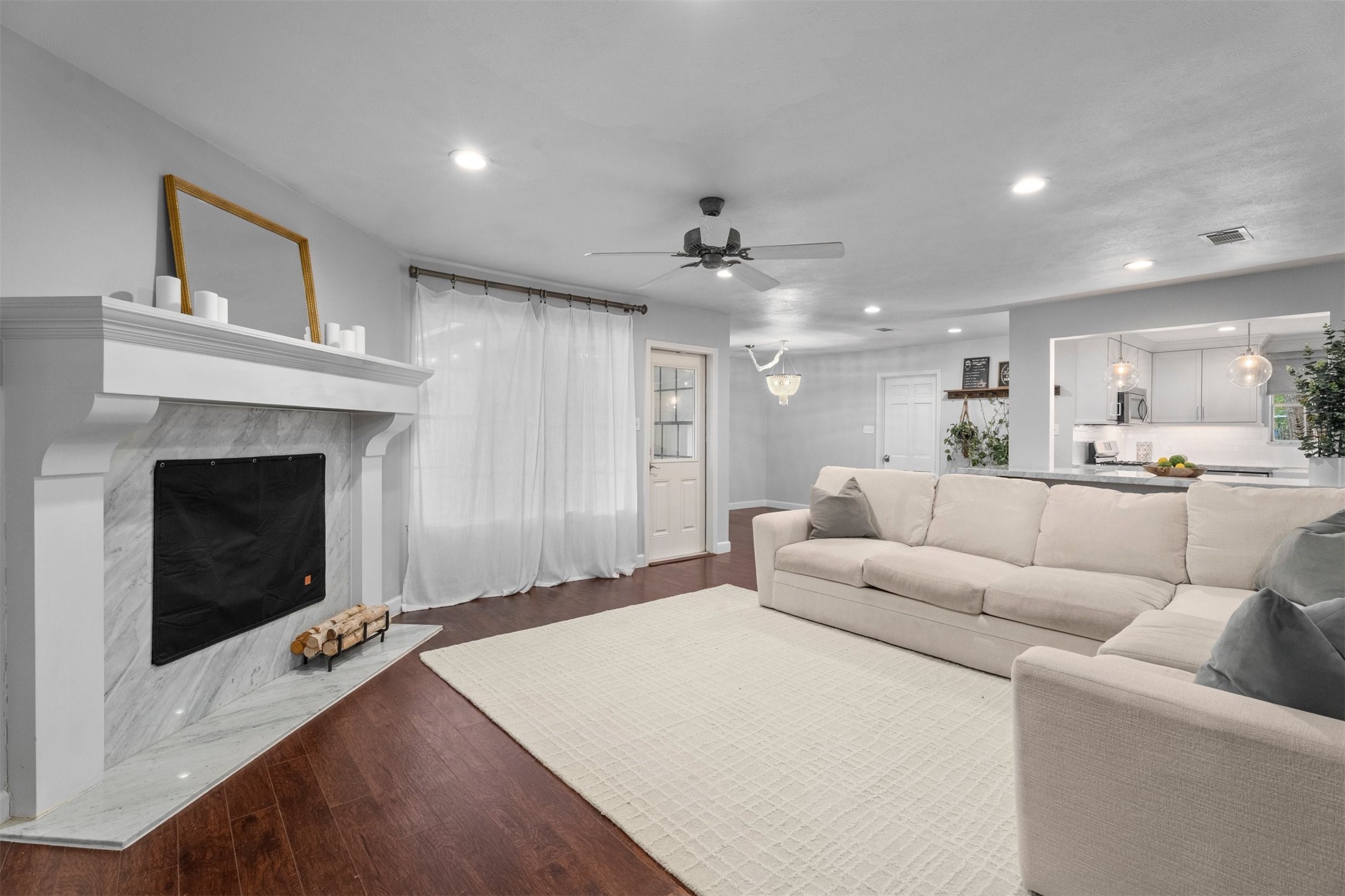 602 Aldersgate Court Katy, TX 77450 - Photo 6 of 24 a living room with furniture and a fireplace